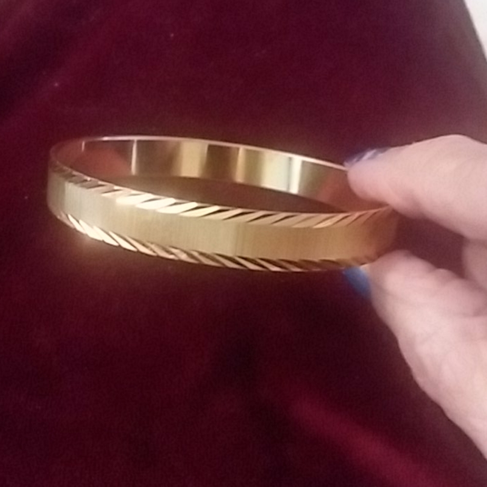 Monet goldtone bangle etched